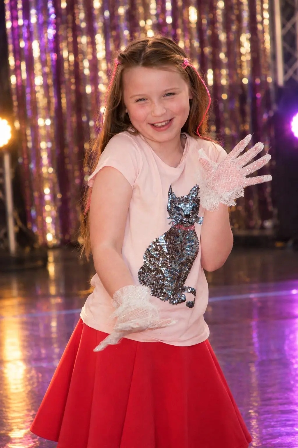 A pupil performing on stage