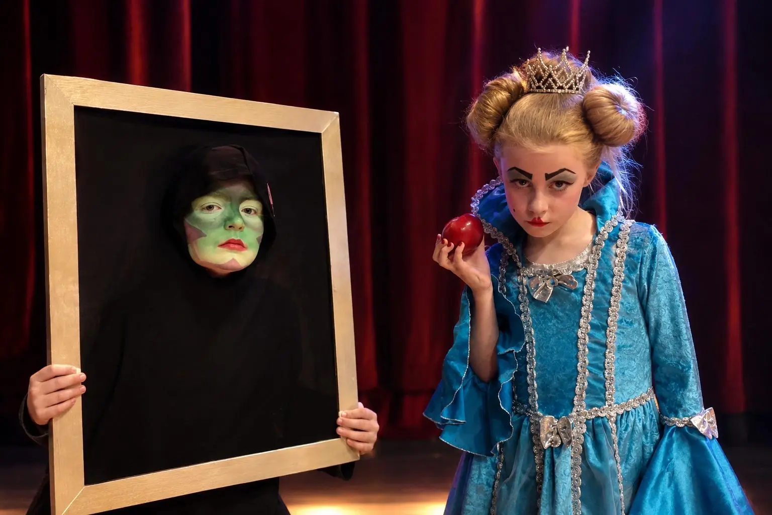 Young performers taking part in a Snow White production